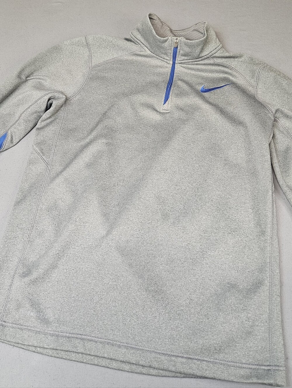Nike Gray Quarter-Zip Performance Pullover with Blue Swoosh